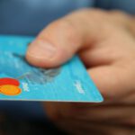 Transfer Credits - Person Holding Debit Card