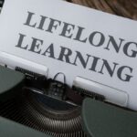 Online Learning Platforms - A typewriter with the word long life learning on it